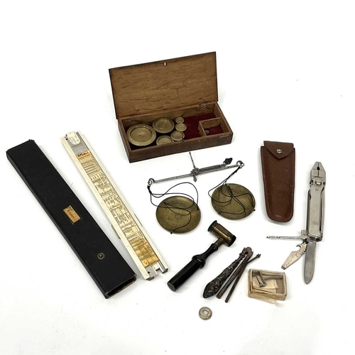 351 - A set of Georgian hand-held scales, in a wooden box with circular flat weights, a 19th Century shot ... 