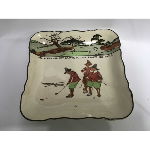 371 - A Royal Doulton series ware dish decorated with transfer printed illustrations in the style of Charl... 