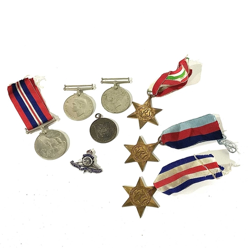502 - A collection of World War Two medals, including The 1939-1945 Star, The Italy Star, The France and G... 