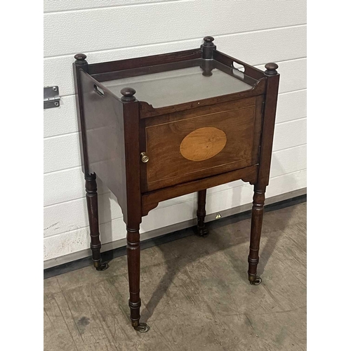 665 - A bedside cabinet, featuring a glass top and parquetry inlaid single door, on turned supports and ca... 