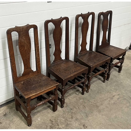 704 - A George III harlequin set of four oak chairs (4)