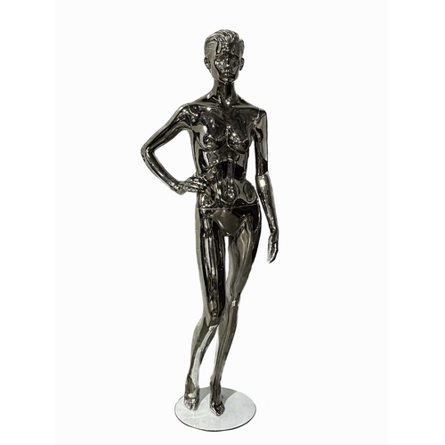 748 - A multipart chrome mannequin, with female features and one arm bent H: 186 cm