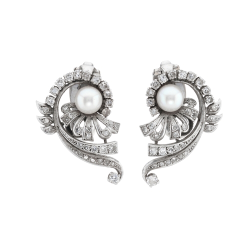 113 - A pair of mid 20th century cultured pearl and circular-cut diamond swirl clip earrings, estimated to... 