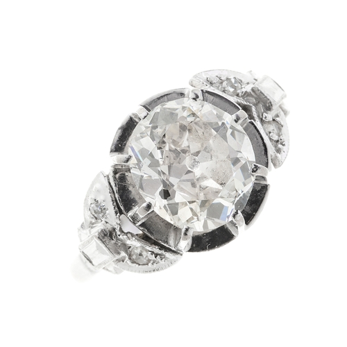 135 - A mid 20th century 18ct gold old-cut diamond single-stone ring, with similarly-cut diamond accent sh... 