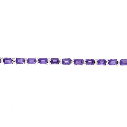 155 - An 18ct gold amethyst line bracelet, with brilliant-cut diamond double spacers, estimated total diam... 