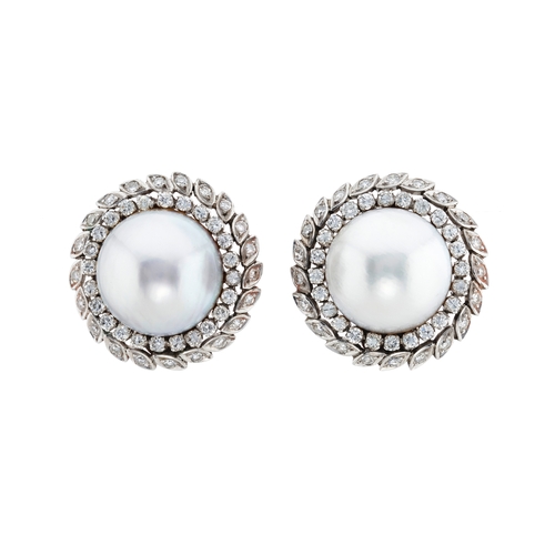 160 - A pair of mabe pearl clip earrings, with brilliant and single-cut diamond double surround, estimated... 