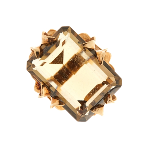 174 - A 1970s 9ct gold citrine single-stone cocktail ring, with fancy-shape claws, citrine estimated weigh... 