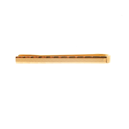 178 - A gold tie pin, of engine turned design, partial marks, length 5cm, 4.3g
