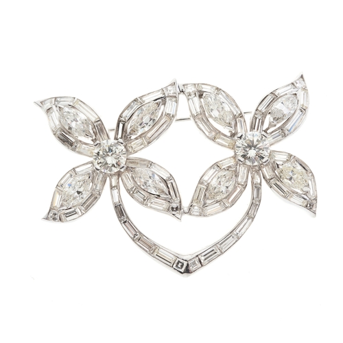 90 - A 14ct gold vari-cut diamond flower brooch, estimated total diamond weight 12ct, principal two diamo... 