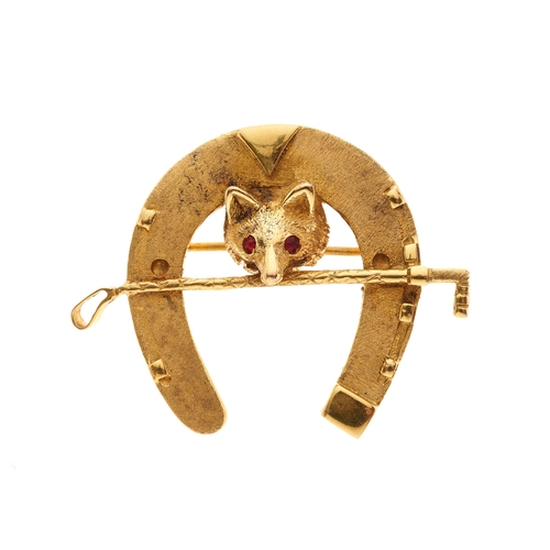 97 - An early 20th century 9ct gold fox mask, crop and horseshoe brooch, with red gem eyes, stamped 9ct, ... 