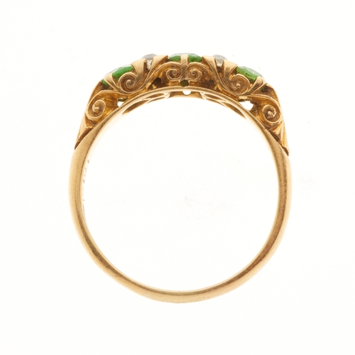 101 - An Edwardian 18ct gold demantoid garnet dress ring, with old-cut diamond double spacers, estimated t... 