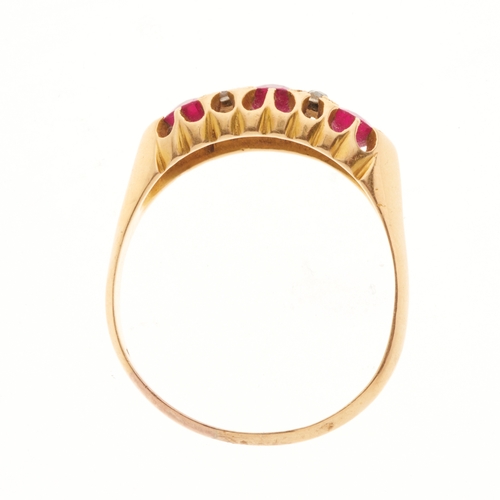 108 - An Edwardian 18ct gold ruby three-stone dress ring, with rose-cut diamond double spacers, hallmarks ... 