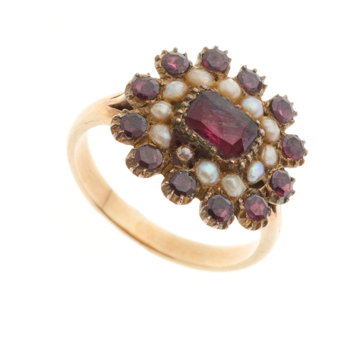 11 - A late Georgian gold garnet and split pearl cluster ring, with replacement band, ring size K, 3.2g