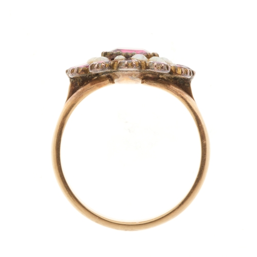 11 - A late Georgian gold garnet and split pearl cluster ring, with replacement band, ring size K, 3.2g