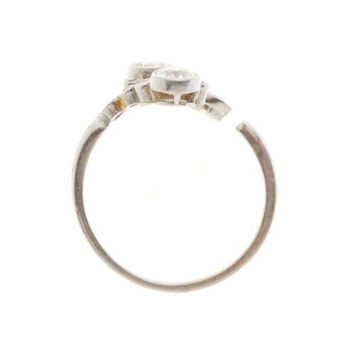 110 - An Art Deco circular-cut diamond openwork dress ring, with grooved band, at fault, estimated total d... 