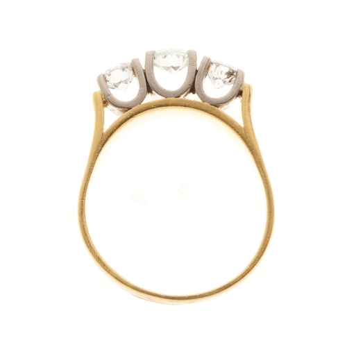 124 - An 18ct gold circular-cut diamond three-stone ring, with slightly tapered band, estimated total diam... 