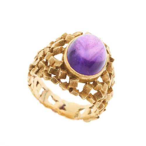 133 - John Donald (attributed), a 1960s 18ct gold amethyst cabochon single-stone ring, with geometric open... 