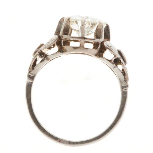 136 - A mid 20th century platinum circular-cut diamond single-stone ring, with vari-cut diamond accent sho... 