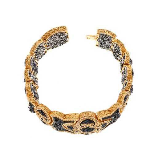 146 - Dimitrios Kapsaskis, a 22ct gold plated and silver, blue gem and cubic zirconia Pomegranate bracelet... 