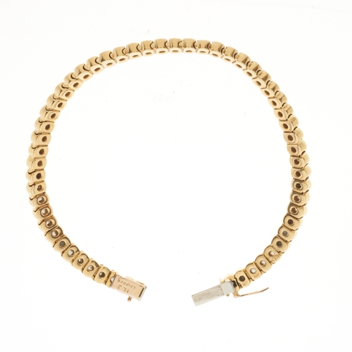 151 - Boodles, an 18ct gold brilliant-cut diamond line bracelet, with partially concealed push-piece clasp... 