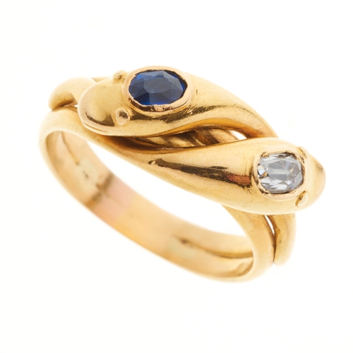 23 - A late Victorian 18ct gold diamond and sapphire double snake ring, with grooved band, diamond estima... 