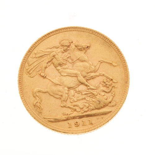 30 - George V, a gold full sovereign coin dated 1911, diameter 2.2cm, 7.9g
