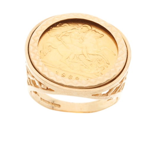 34 - A gold half sovereign coin ring, sovereign dated 1982, within a 9ct gold mount, band with hallmarks ... 