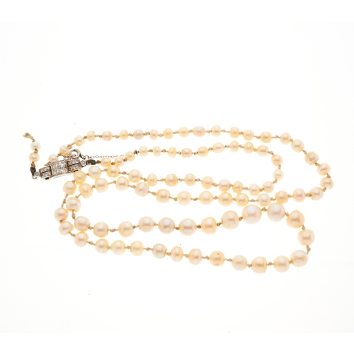 4 - An early 20th century graduated pearl single-strand necklace, with platinum single-cut diamond clasp... 