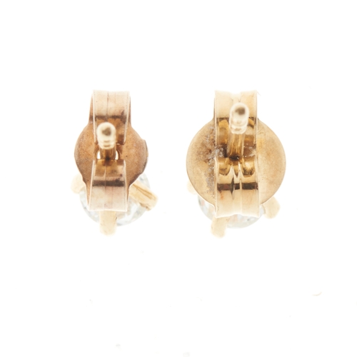 54 - A pair of 18ct gold brilliant-cut diamond single-stone stud earrings, estimated total diamond weight... 