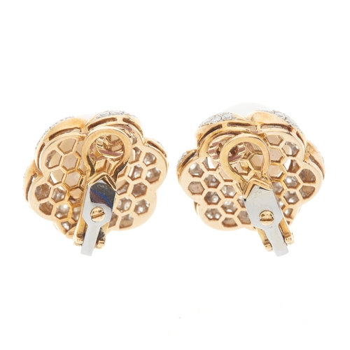 59 - A pair of 18ct gold cultured pearl flower clip earrings, with pave-set diamond surround, estimated t... 