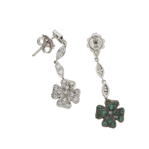 162 - A pair of 18ct gold brilliant-cut diamond floral cluster drop earrings, each with circular-cut emera... 