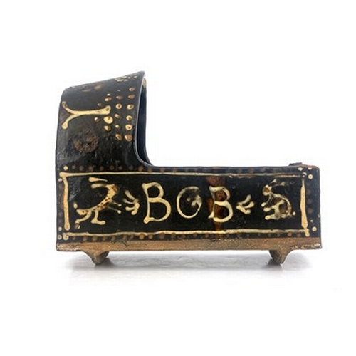 1006 - A Yorkshire slipware model cradle, 19th century, slab construction, decorated with names Bob and Bet... 