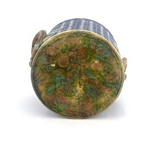 1007 - George Jones, a majolica jardiniere, modelled as a woven basket with knotted branch handles, turquoi... 