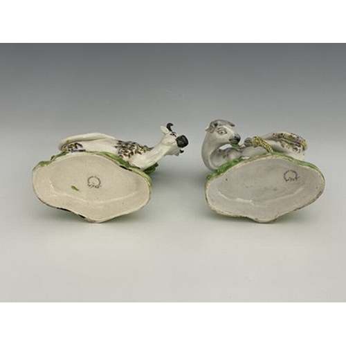 1008 - A pair of spongeware decorated figures of cows against bocage, Staffordshire, Tunstall Group, circa ... 