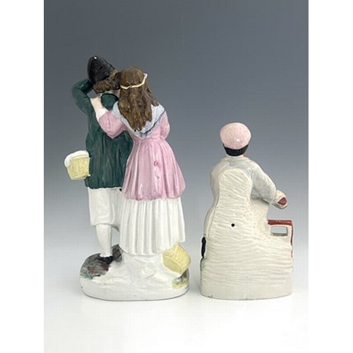 1016 - A Staffordshire figure group, late nineteenth-century, 'Fisherman and Companion' figure modelled as ... 