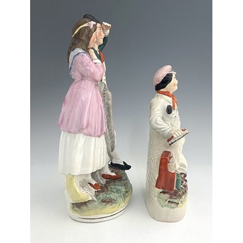 1016 - A Staffordshire figure group, late nineteenth-century, 'Fisherman and Companion' figure modelled as ... 