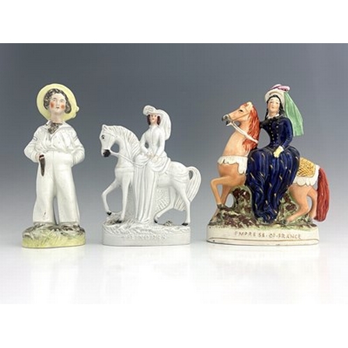 1017 - Three Staffordshire royal figures, circa 1850, modelled as a juvenile Prince of Wales in a sailor su... 