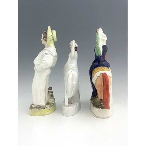 1017 - Three Staffordshire royal figures, circa 1850, modelled as a juvenile Prince of Wales in a sailor su... 