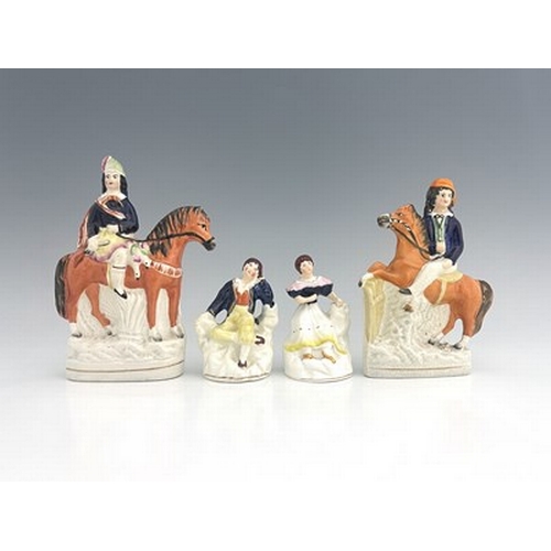 1018 - A Staffordshire figure group, circa 1850, modelled as two figures mounted on horseback, likely to be... 