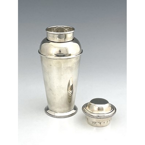 102 - An Art Deco silver cocktail shaker, Adie Brothers, Birmingham 1929, shouldered milk churn form with ... 