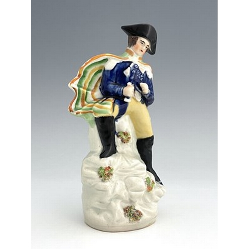 1022 - A Staffordshire portrait figure of Napoleon, circa 1840, modelled in military uniform and bicorn hat... 