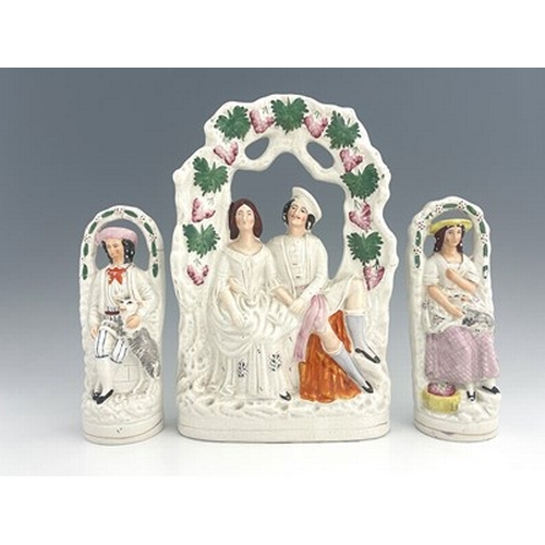 1025 - A Staffordshire arboreal figure group, circa 1870, figures glazed white with polychrome enamel and g... 