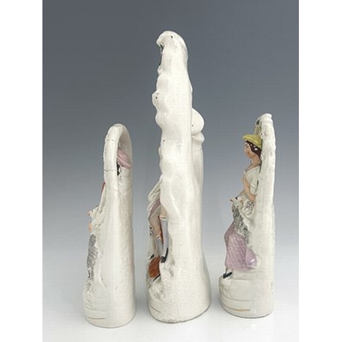 1025 - A Staffordshire arboreal figure group, circa 1870, figures glazed white with polychrome enamel and g... 