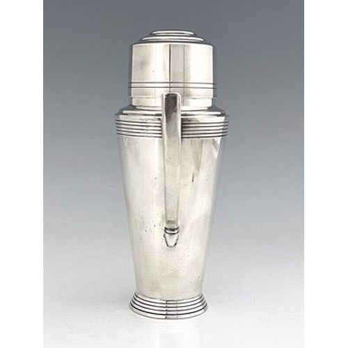 103 - Keith Murray for Mappin and Webb, an Art Deco silver plated cocktail shaker, circa 1933, shouldered ... 