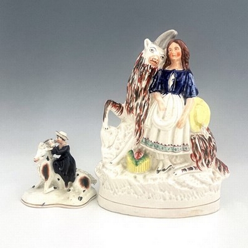 1037 - Staffordshire figures of royal children with goats, circa 1850, modelled as a royal portrait of the ... 