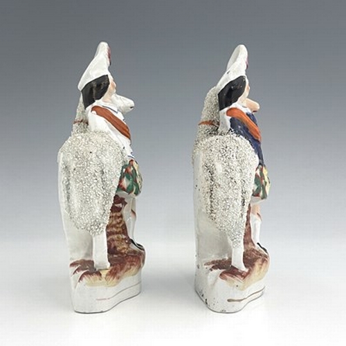 1038 - A pair of Staffordshire figures of royal children with sheep, circa 1860, modelled as royal portrait... 