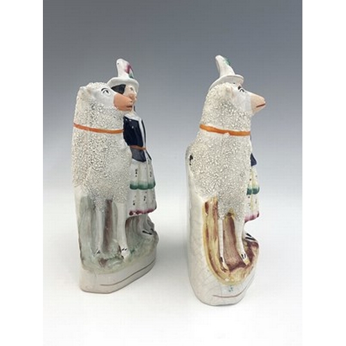 1039 - A pair of Staffordshire figures of royal children with sheep, circa 1860, modelled as royal portrait... 