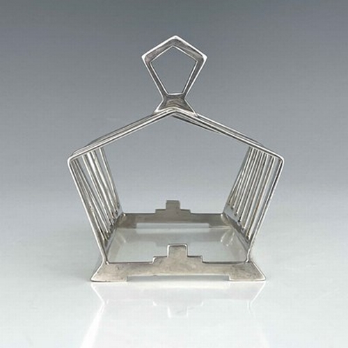 104 - Keith Murray for Mappin and Webb, an Art Deco silver plated six division toast rack, circa 1934, the... 