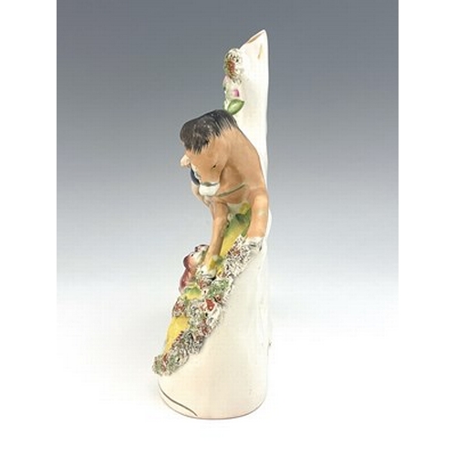 1041 - A Staffordshire spill vase modelled as an equestrian figure of Mazeppa, circa 1860, central draped f... 