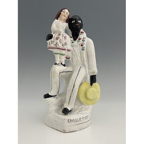 1047 - A Staffordshire figure of 'Uncle Tom' and 'Younge Eva', circa 1850, white enamel with painted polych... 